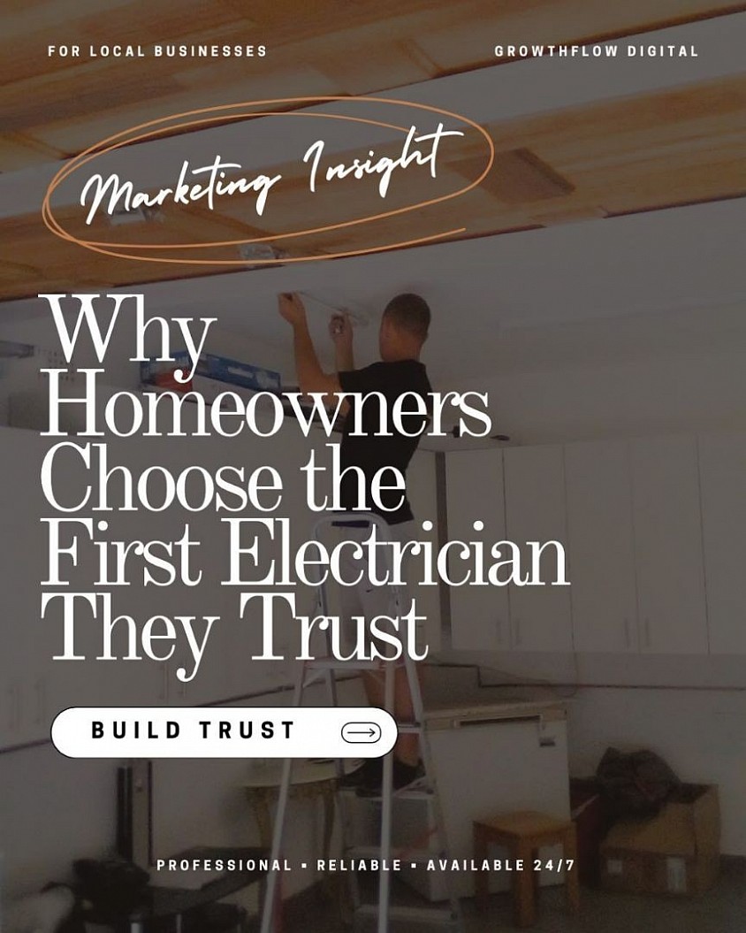 Professional electrician working on residential ceiling wiring.